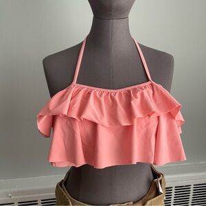 Halter bikini top with ruffles.